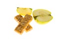 Muesli bars dried fruit on isolated background with apple Royalty Free Stock Photo