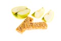 Muesli bars dried fruit on isolated background with apple Royalty Free Stock Photo