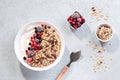 Muesli bowl or granola bowl with yogurt and berries on concrete table top. Healthy breakfast, top view. Dish suitable for diet, Royalty Free Stock Photo