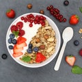 Muesli breakfast fruits yogurt strawberries cereals berries bowl Royalty Free Stock Photo