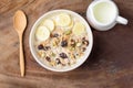 Muesli cereal with slice banana and milk in a bowl Royalty Free Stock Photo