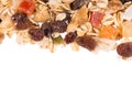 Muesli with dried fruits close up from above isolated on a white background Royalty Free Stock Photo