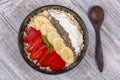 Muesli made from red strawberries, banana, chia seeds, oat flakes, honey and dressed with yogurt Royalty Free Stock Photo