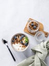 Muesli with vegetarian yogurt, banana and blueberries in a bowl on a light background. Healthy and dietary homemade granola for Royalty Free Stock Photo