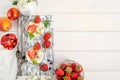 Muesli with yogurt and fresh strawberries on a white wooden background with copy space. flat lay Royalty Free Stock Photo