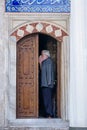 A muezzin calling for prayer in Mosque in Istanbul