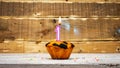 Happy birthday copy space. Muffin candle burning background for anniversary 1