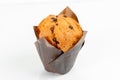 Muffin cup cake closeup. With chocolate chips and fruit filling Royalty Free Stock Photo