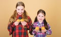 Muffin fight. Small children happy smiling with quickbread muffins. Happy little girls baking breakfast muffins at home Royalty Free Stock Photo