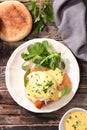 Muffin with salmon, poached egg and sauce-