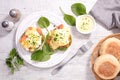 Muffin with salmon, poached egg and sauce