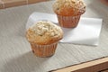 Muffin with sponge on a wooden table Royalty Free Stock Photo