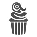 Muffin witth eye on top solid icon. Halloween cupcake vector illustration isolated on white. Halloween sweets glyph