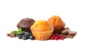 Muffins, berries and chocolate isolated on background Royalty Free Stock Photo