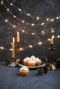 Muffins with butter cream in a vintage plate. New Year`s festive desserts