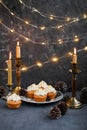 Muffins with butter cream in a vintage plate. New Year`s festive desserts