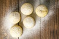 Muffins with lemon on dark wooden table. Top views, close-up