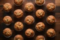 Muffins neatly arranged on the kitchen table in flat lay
