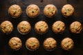 Muffins neatly arranged on the kitchen table in flat lay