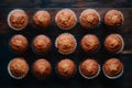 Muffins neatly arranged on the kitchen table in flat lay