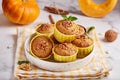 Muffins with pumpkin, walnuts and cinnamon. Delicious homemade dessert. Royalty Free Stock Photo