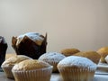 Muffins sprinkled with powdered sugar, close-up Royalty Free Stock Photo