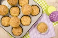 Muffins in a tray on colorful napkins. Royalty Free Stock Photo