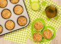 Muffins in a tray and on green napkin. Royalty Free Stock Photo