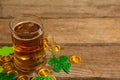 Mug of beer, chocolate gold coins and shamrock for St Patricks Day