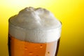 Mug of beer with froth close-up