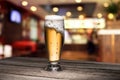 Mug of beer on table Royalty Free Stock Photo