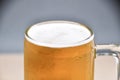 Mug of beer on white background