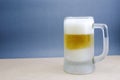 Mug of beer on white background