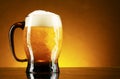 Mug of beer on a yellow Royalty Free Stock Photo