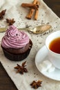 Mug of blacktea with chocolate cupcakes Royalty Free Stock Photo