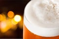 Mug of cold beer with foam, close-up view Royalty Free Stock Photo