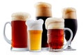 Mug collection of frosty beer with foam Royalty Free Stock Photo