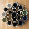 Mug contains black coffee, and several coffee beans are scattered Royalty Free Stock Photo