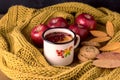 Mug or Cup of Hot Berry Lemon Tea With Yellow Warm Knitted Scarf Autumn Maple Leaves Wooden Background Autumn Cold Season Red Appl Royalty Free Stock Photo