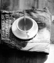 Mug filled boiling water and tea bag on blue jeans background. Process tea brewing in ceramic mug. Herbal green or black