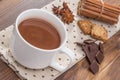 Mug filled with homemade hot chocolate, cookie with spice Royalty Free Stock Photo