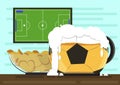 Mug in the form of soccer ball with foam kraft beer and a plate of crispy potato chips.Against the backdrop of the TV