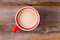 Mug of fresh hot latte morning coffee