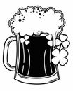 A mug of frothy beer is adorned with three-leaf clovers, symbolizing a festive or Irish theme Royalty Free Stock Photo