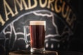 mug full of chopp, with dark chopp on a rustic table. Royalty Free Stock Photo