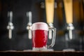 Mug full of chopp, with chopp pilsen on a rustic table Royalty Free Stock Photo
