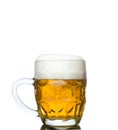 Mug full of fresh beer isolated on white Royalty Free Stock Photo