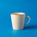 The mug has a minimalist design with a thin, dark rim near the top Royalty Free Stock Photo
