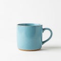 The mug has a simple cylindrical shape with a rounded handle Royalty Free Stock Photo