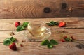 Mug with herbal tea of strawberries and strawberry Royalty Free Stock Photo